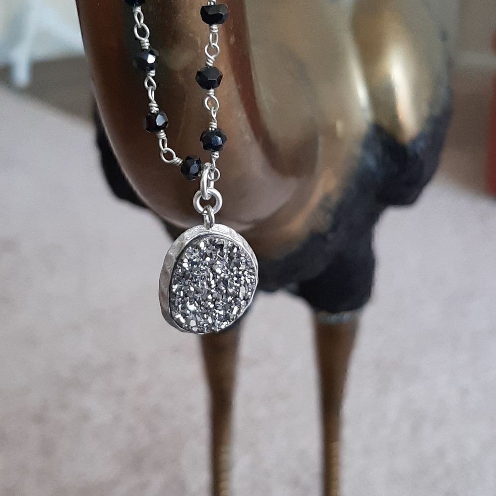 Vintage sterling silver necklace with onyx beads and Drusie pendant.
